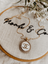 Load image into Gallery viewer, Repurposed Vintage Authentic Designer Button made into a necklace