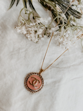 Load image into Gallery viewer, Repurposed Vintage Authentic Designer Button made into a necklace